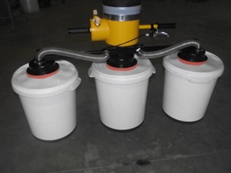Palettisation de pots de peinture avec palonnier 3 ventouses